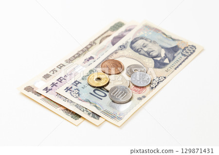 Japanese money on white background 129871431