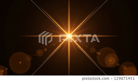 abstract lens flare light over black 129871451