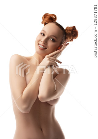 Topless happy woman with ginger hair smiles into camera Topless happy woman with ginger hair smiles into camera 129871781