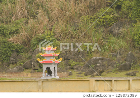 Pagoda in a cemetery. Pagoda in a cemetery. 129872089