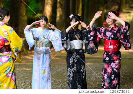 Women and girls wearing yukata Women and girls wearing yukata 129873621