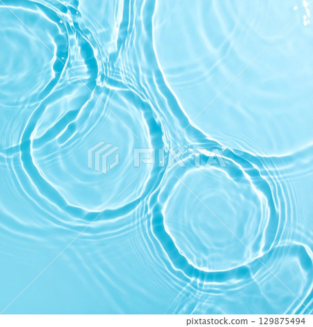 Light blue water with ripples and waves background Light blue water with ripples and waves background 129875494