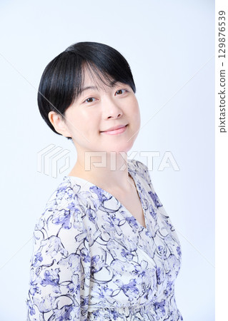 Portrait of a middle-aged woman with short hair 129876539