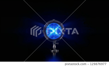 Blue lamp light shining in the dark, over black background Blue lamp light shining in the dark, over black background 129876977