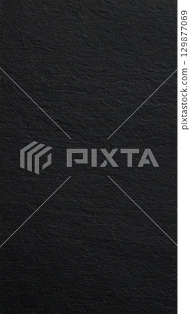 Black rough paper texture, close view paper pattern background 129877069