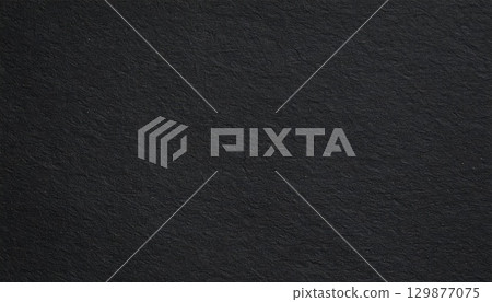 Black rough paper texture, close view paper pattern background 129877075