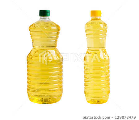 Vegetable oil in platic bottle isolated on white background. 129878479