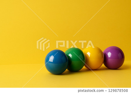 Red, orange, green, and blue marbles with words diversity, inclusion, equity, and fun, symbolizing unity through colorful representation Red, orange, green, and blue marbles with words diversity, inclusion, equity, and fun, symbolizing unity through colorful representation 129878508