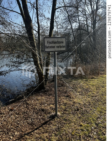 A sign reading "Fish spawning area. No entry" near the town of Herstel, Germany A sign reading "Fish spawning area. No entry" near the town of Herstel, Germany 129879741