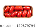 Fresh plum tomatoes, Roma tomatoes in a cardboard punnet. Also known as processing or paste tomatoes, oval shaped, used for canning or producing tomato paste, because of its slender and firm nature. 129879794