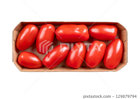Fresh plum tomatoes, Roma tomatoes in a cardboard punnet. Also known as processing or paste tomatoes, oval shaped, used for canning or producing tomato paste, because of its slender and firm nature. Fresh plum tomatoes, Roma tomatoes in a cardboard punnet. Also known as processing or paste tomatoes, oval shaped, used for canning or producing tomato paste, because of its slender and firm nature. 129879794