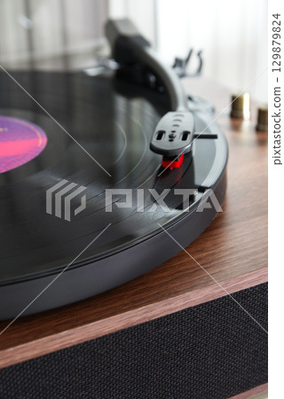 Close-up of a vintage-style turntable 129879824