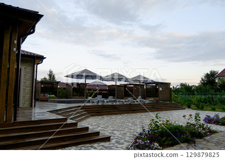 Pool on the terrace with a view of nature 129879825