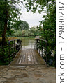 Wooden pier near the river close-up 129880287