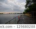 Wooden pier near the river close-up 129880288