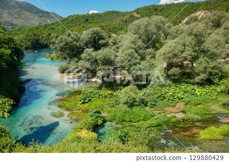 Turquoise spring water of Blue Eye Nature Monument near to Saranda, Albania 129880429