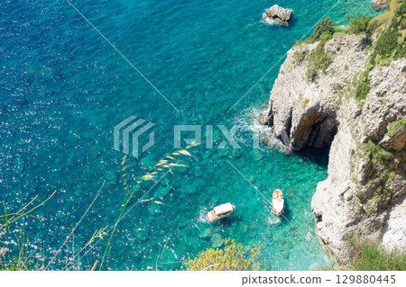 natural cave and cliffs on the coast of Montenegro, Europe. Calypso beach natural cave and cliffs on the coast of Montenegro, Europe. Calypso beach 129880445