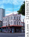 A retro Chinese-style building on a street corner (Kaiando) 129880967