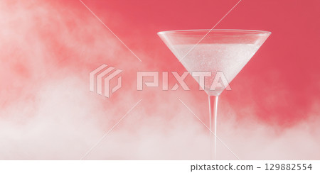 Guava colored cocktail emits dry ice vapor in a vibrant sci-fi bar setting, creating a captivating atmosphere. 129882554
