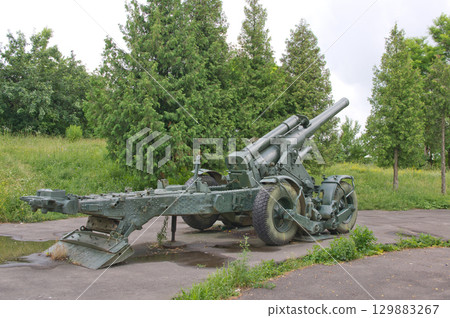 An old cannon against the backdrop of summer 129883267