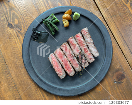 Hitachi wagyu striploin steak, authentic japanese cuisine at japanese charcoal grill restaurant and bar. 129883677