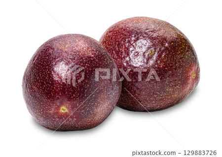 Closeup of ripe passion fruit or passionfruit isolated on white background. 129883726