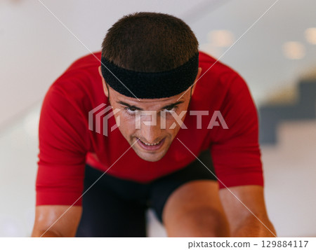 Focus Athletic Man Cycling Indoors 129884117