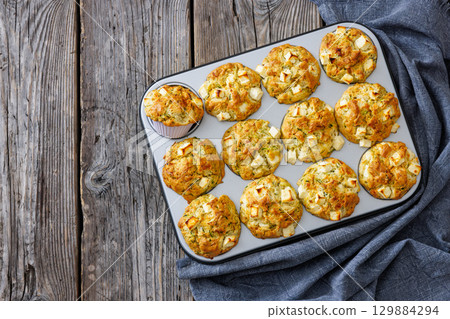 Greek Style Zucchini Feta Muffins, top view Greek Style Zucchini Feta Muffins, top view 129884294