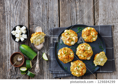 Greek Style Zucchini Feta Muffins, top view Greek Style Zucchini Feta Muffins, top view 129884299