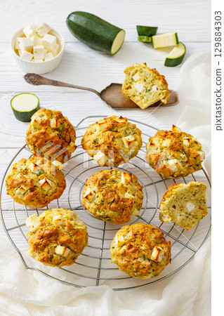 Greek Style Zucchini Feta Muffins, top view 129884303