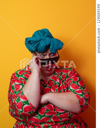 Cool plus size woman crossing arms with sunglasses Cool plus size woman crossing arms with sunglasses 129884549