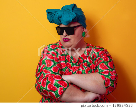 Cool plus size woman crossing arms with sunglasses Cool plus size woman crossing arms with sunglasses 129884553