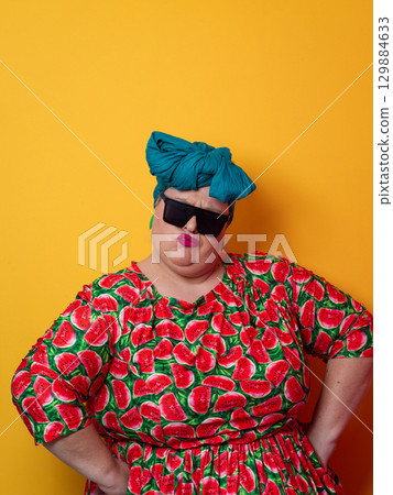 Cool plus size woman crossing arms with sunglasses Cool plus size woman crossing arms with sunglasses 129884633