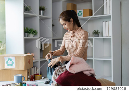 Volunteers Organizing Donations at Food Banks and Community Centers for Charitable Support and Assistance 129885026