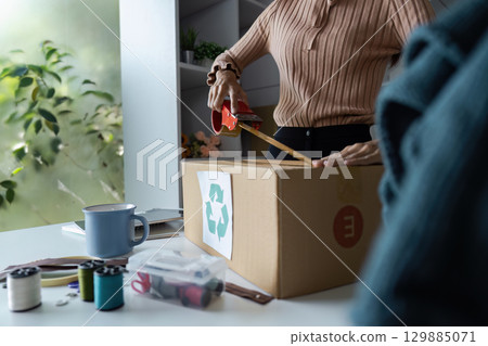 Volunteers Organizing Donations at Food Banks and Community Centers for Charitable Support and Assistance 129885071