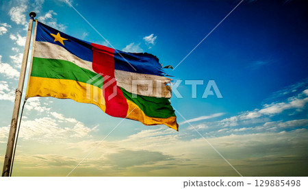 An old, torn and decayed flag of the Central African Republic. 129885498