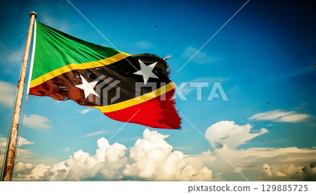 An old, torn and decayed flag of Saint Kitts and Nevis. 129885725