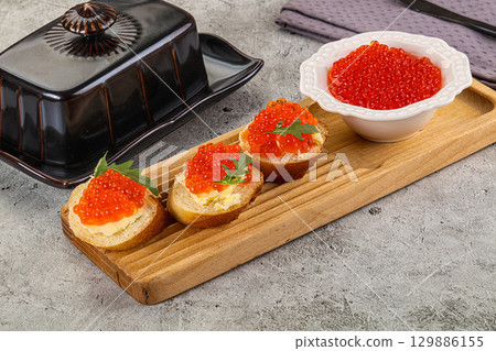 Luxury toast with red caviar 129886155