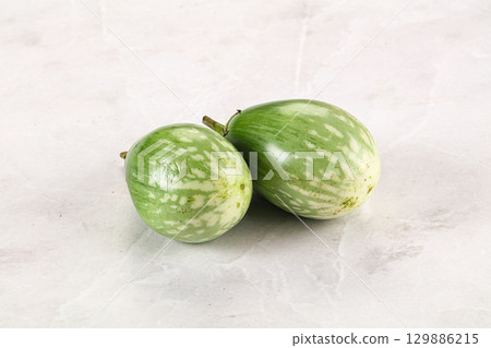 Ripe green mini eggplants heap Ripe green mini eggplants heap 129886215