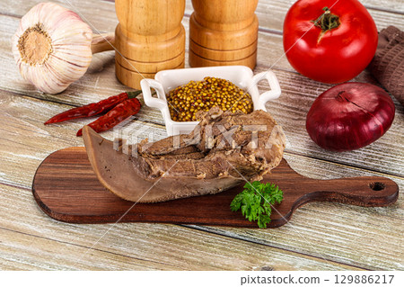 Steamed pork tongue with mustard Steamed pork tongue with mustard 129886217