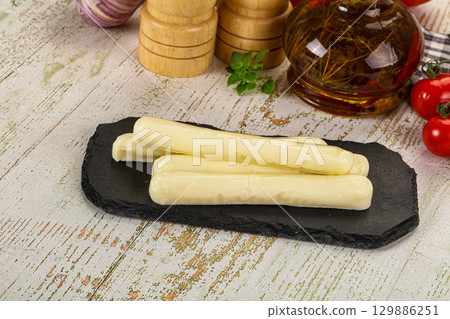 White mozzarella sticks over board 129886251