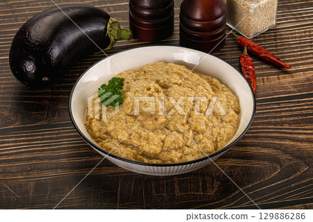 Eggplant dip - Mutabal with tahini paste 129886286