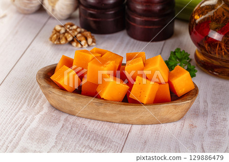 Yellow cheddae cheese cubes snack 129886479