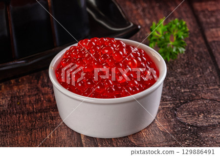 Salmon red caviar in the bowl Salmon red caviar in the bowl 129886491