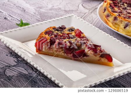 Crusty pie with fresh cherry 129886519
