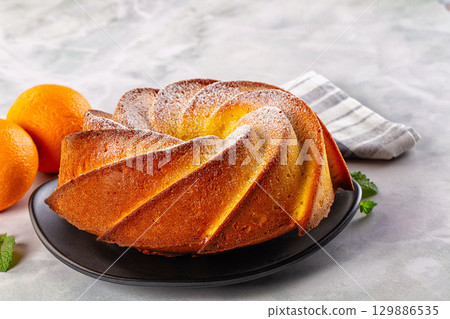 Italian traditional orange cake Chiambella 129886535