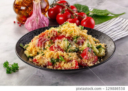 Cous cous with vegetables tabulle 129886538