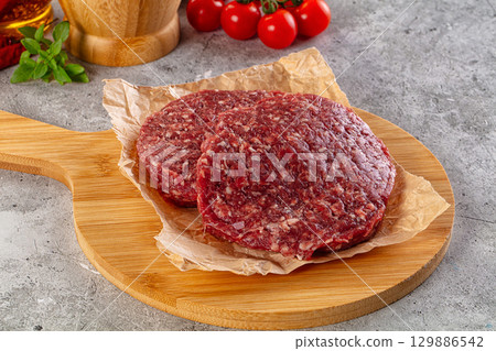 Raw beef burger cutlet for grill Raw beef burger cutlet for grill 129886542