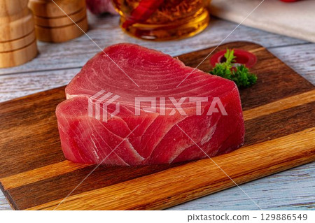 Raw fresh tuna fillet cut Raw fresh tuna fillet cut 129886549