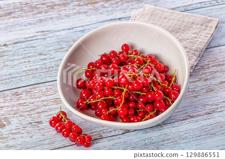Raw ripe sweet juicy red currant Raw ripe sweet juicy red currant 129886551